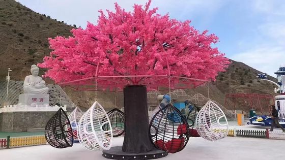 Equipo de juegos interactivo con columpio de árbol floreciente de alta durabilidad
